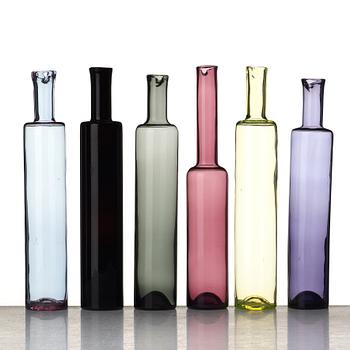 Nanny Still, a set of six different coloured glass bottles/vases, Riihimäen Lasi Oy, Finland, mid 20th century.