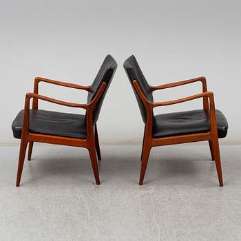 KARL ERIK EKSELIUS, a pair of late 20th Century easy chairs.