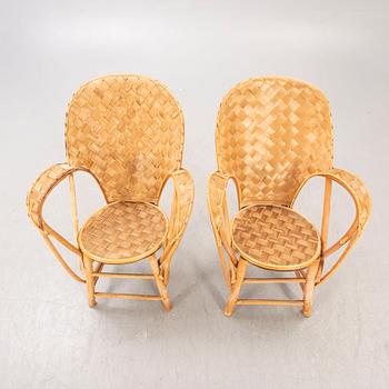 A pair of Pascal Raffier "Le Corbusier" chestnut chairs France late 20th century.