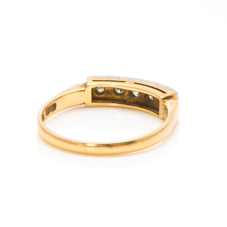 An 18K gold ring with diamonds ca. 0.22 ct in total. Päiviö Veikko, Turku 1955.