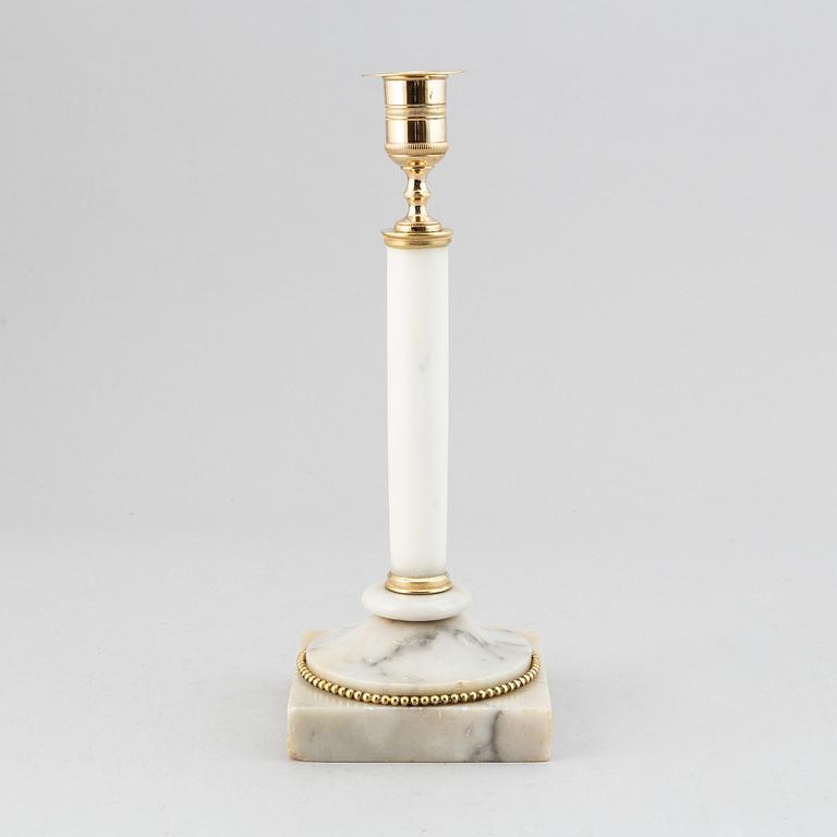 A late Gustavian brass and marble candelabra/candle holder, around the year 1800.