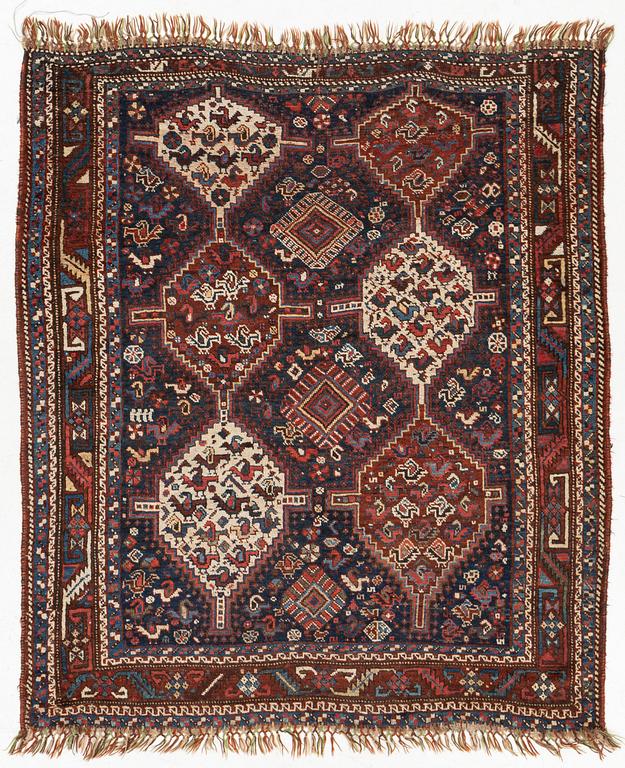 An antique rug, Shiraz, ca. 180 x 155 cm.