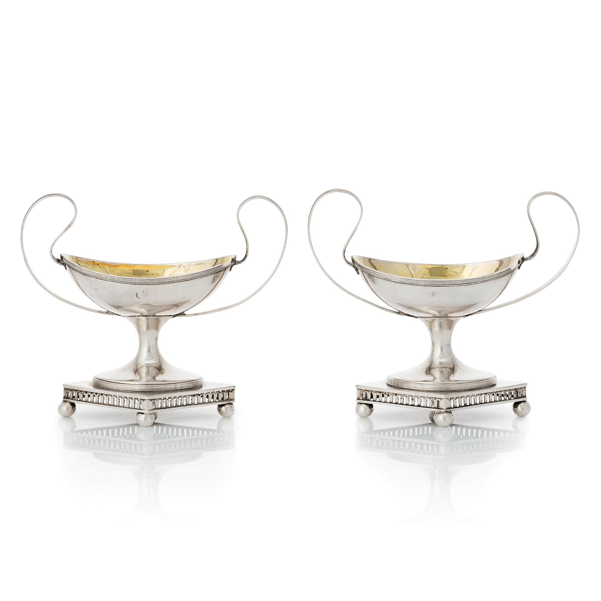 A pair of Swedish late Gustavian parcel-gilt silver salt-cellers, mark of Lars Söderström, Umeå (1815-1833).