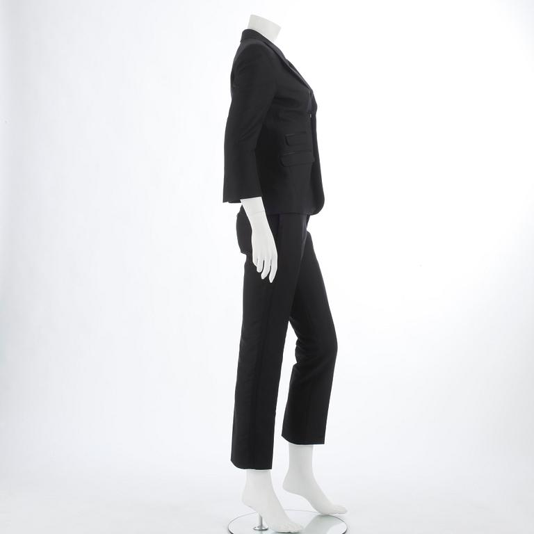 DSQUARED, a black cotton and silk two-piece suit consisting of jacket and pants. Size 42.