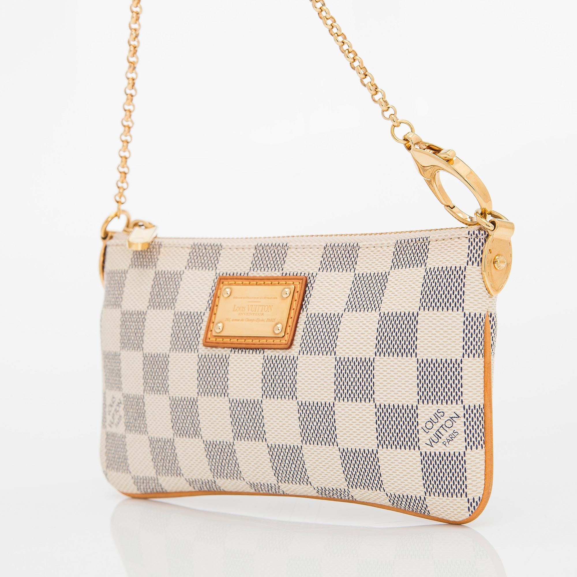 Louis Vuitton, a Damier Azur 'Milla MM Pochette' bag.