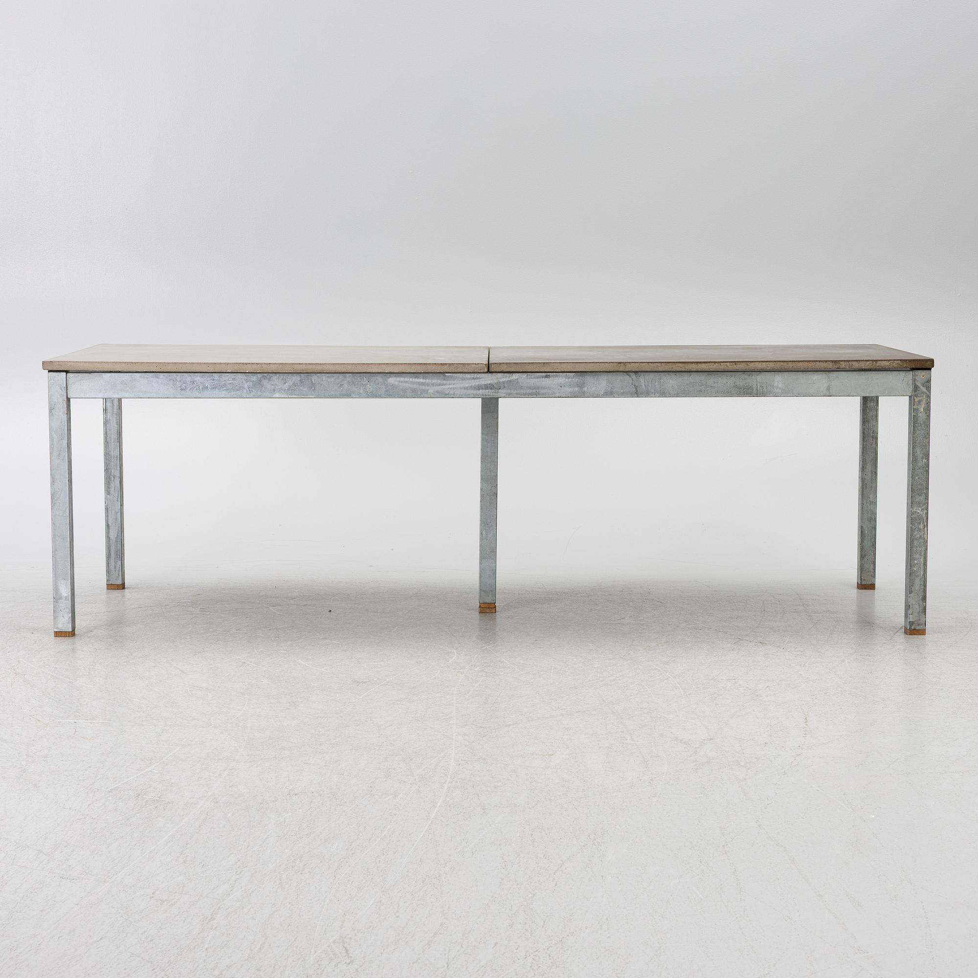 A table, probably MBJ Design.