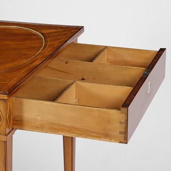 A late Mustavian mahogany table attributed to L. Qvarnberg (master in Stockholm 1801-13).
