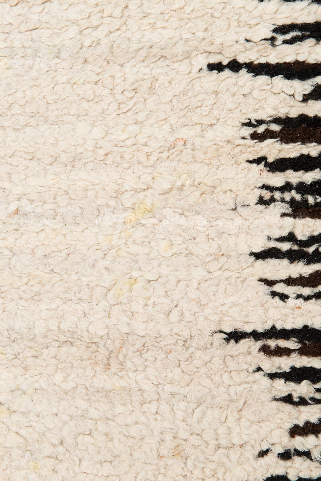 A sheepskin carper for Furcarpet. Circa 300x95 cm.