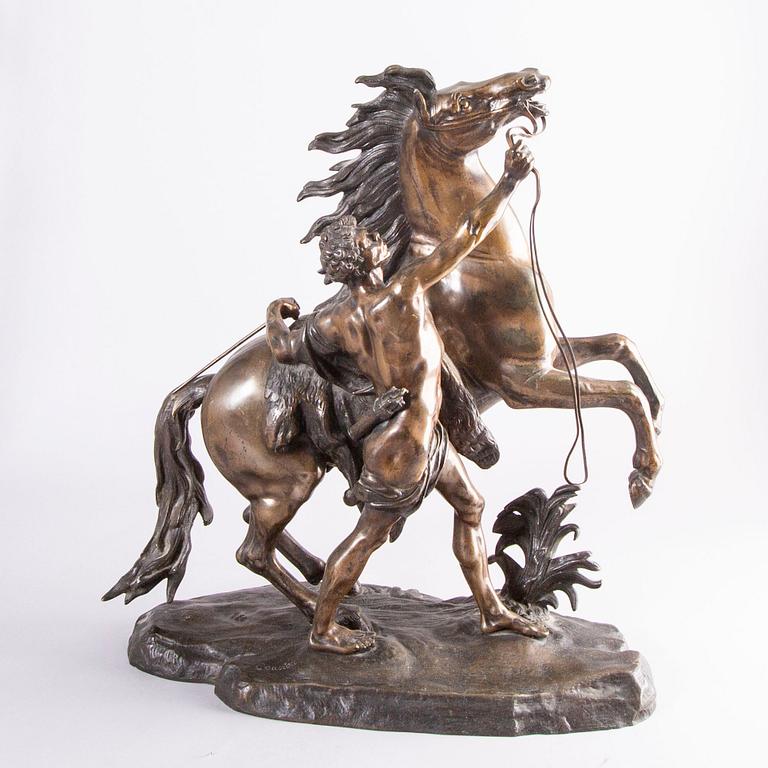 Guilliaume Coustou, after, a signed bronze sculpture  "Chevaux de Marly" from the second part of the 1800's.