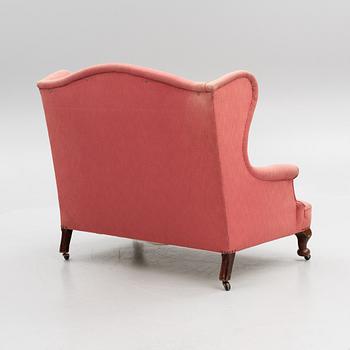 Sofa, circa 1900.