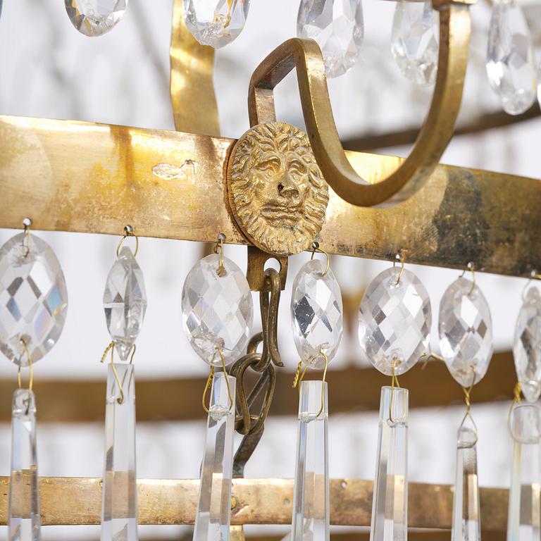 A late Gustavian thirteen-light gilt brass and cut glass chandelier, Stockholm, late 18th century.