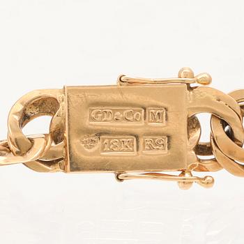 An 18K gold Bismarck bracelet.