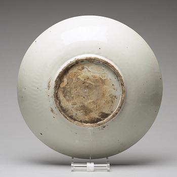 A large white glazed Swatow dish, Ming dynasty (1368-1644).