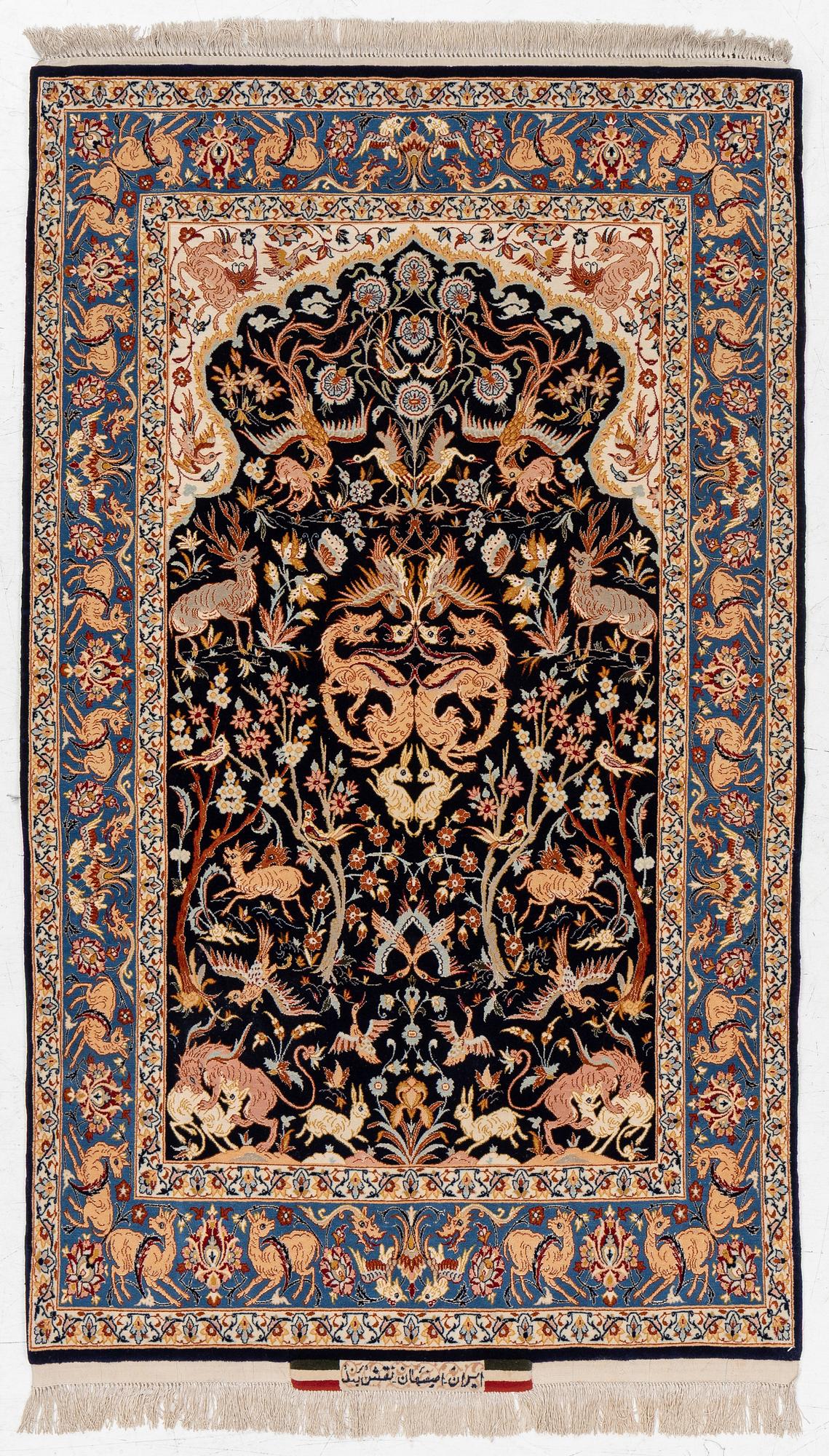 A semi-antique part silk Isfahan, signed, c. 176 x 107 cm.