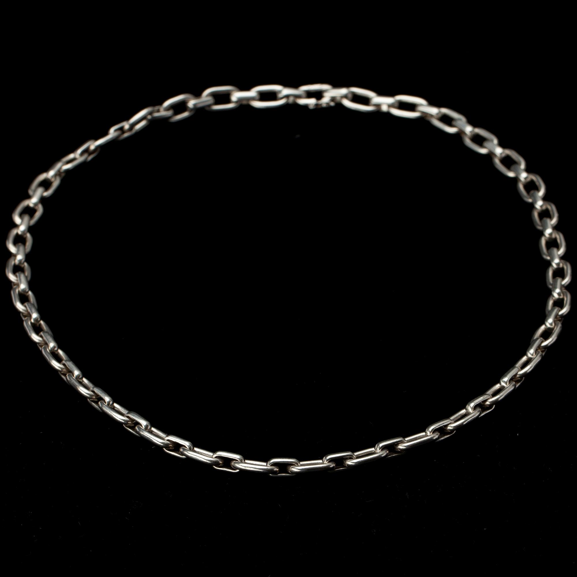 HALSKED samt ARMRING, sterling silver, engelska kontrollstämplar. Vikt tot. 115,4 g.