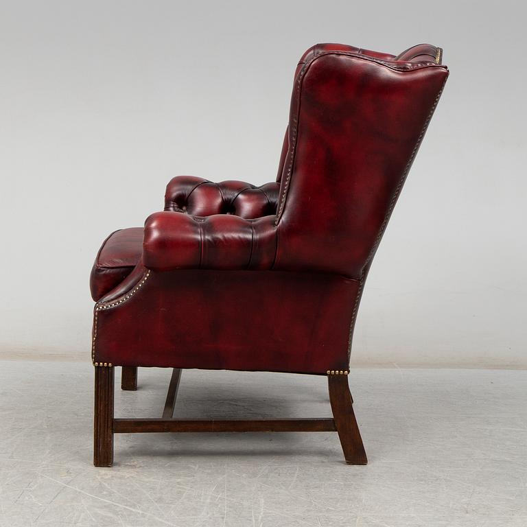 A late 20th Century leather easy chair.