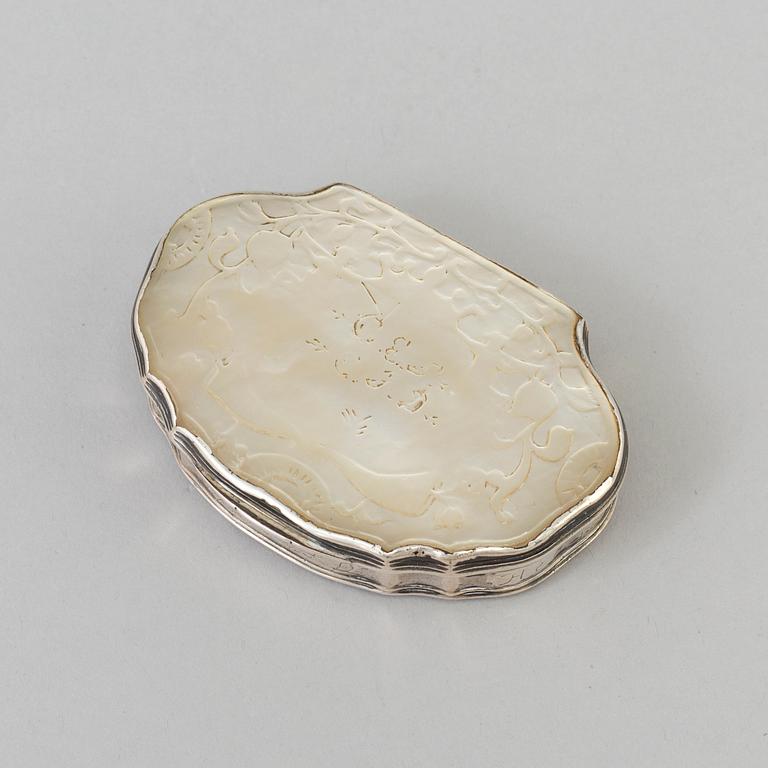 An 18th century silver and mother-of-pearl rococo snuff box.