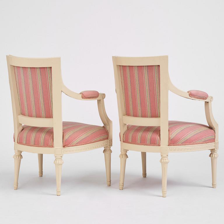 A pair of late Gustavian open armchairs by E. Öhrmark (master in Stockholm 1777-1813).