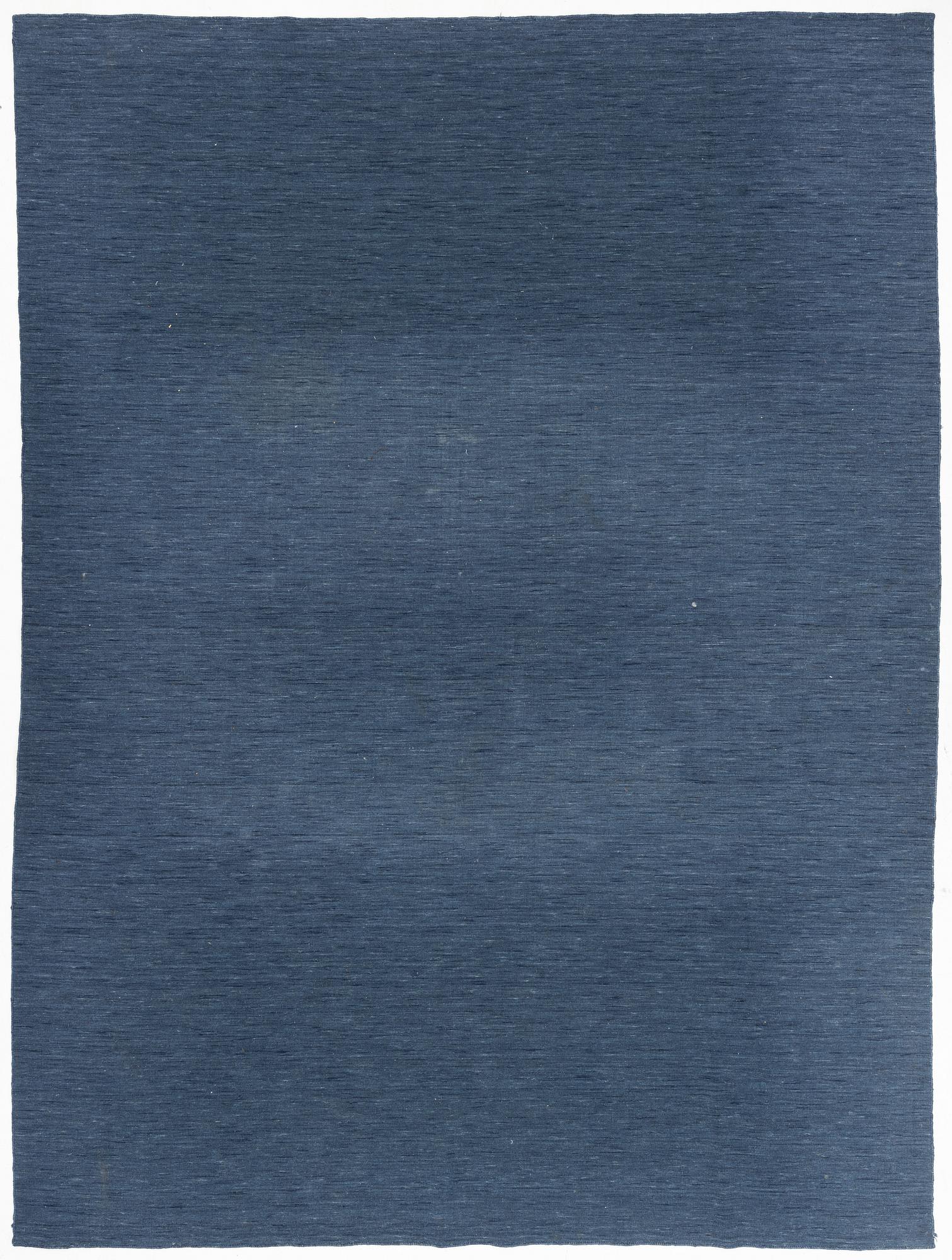 A loomed carpet, ca 400 x 300 cm.
