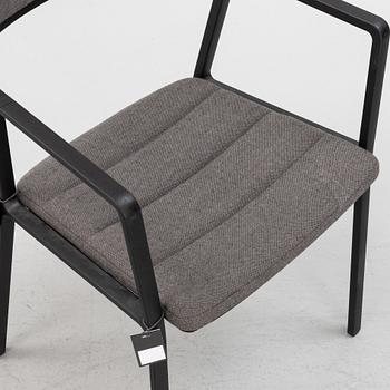A pair of model 451 steel armchairs from Vipp.