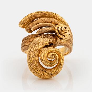 An 18K gold Ilias Lalaounis ring.