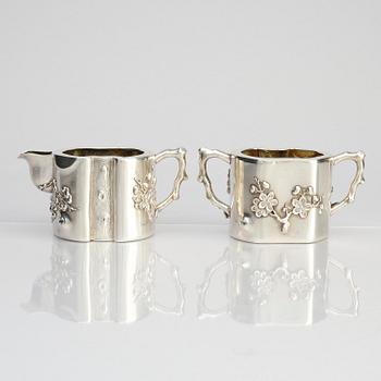 A Chinese Export silver tea set, marked Hung  Chong &  Co, Shanghai, 20th century.