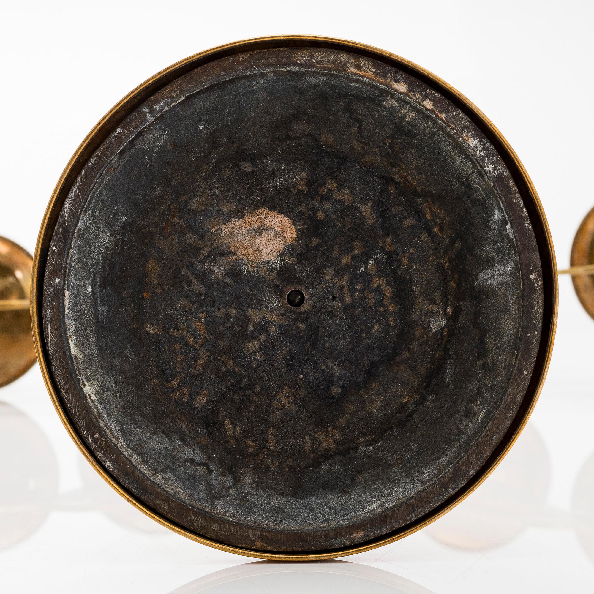 A pair of brass candelabras, early 20th century.