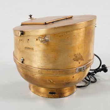 A binnacle in brass, made in the second half of the 20th century.