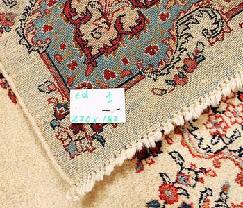 A Kerman carpet, c. 270 x 187 cm.