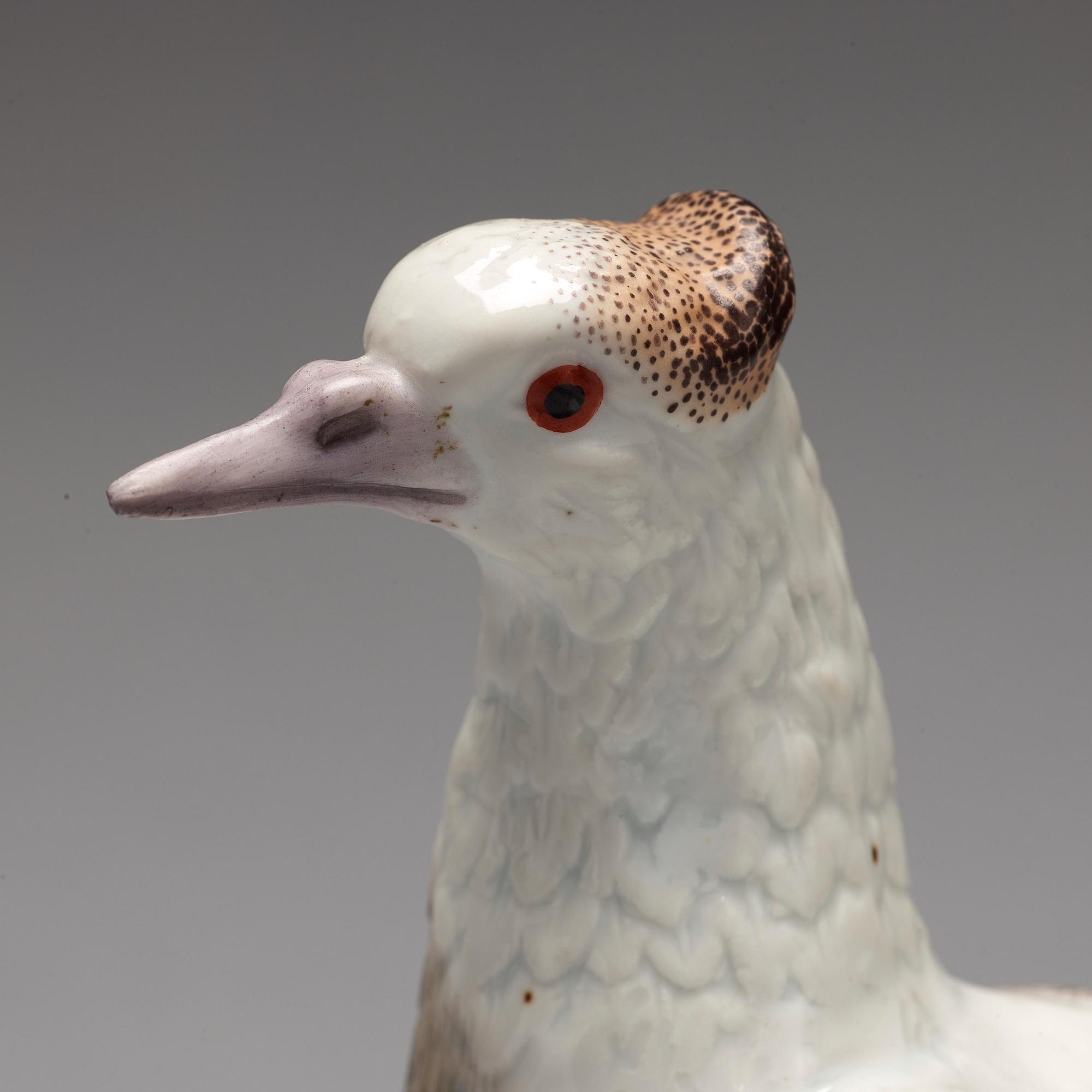 A porcelain figure of a dove, possibly Samson.