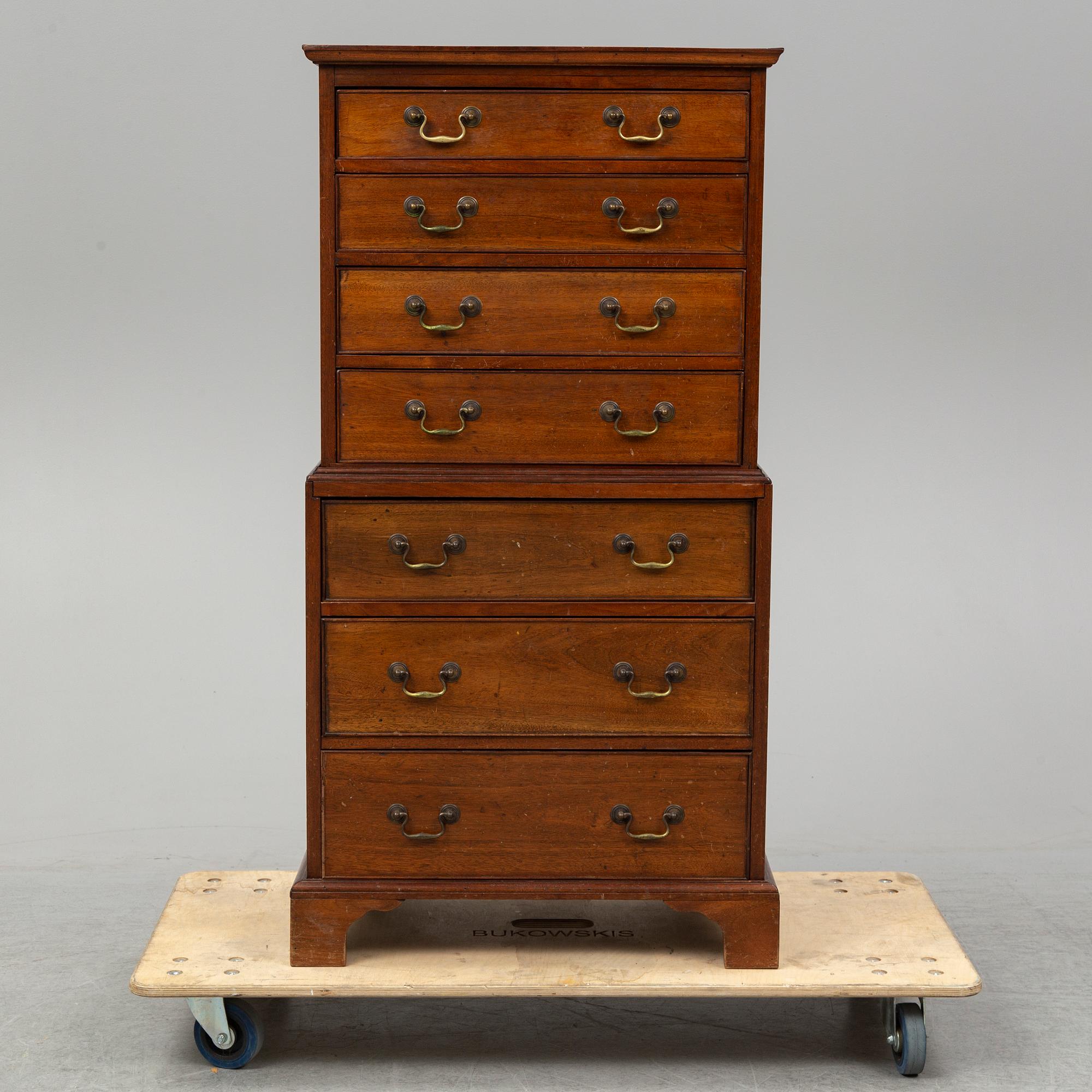 A mahogany 'Tallboy' chest of drawers.