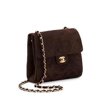 545. CHANEL, a brown suede shoulderpurse.