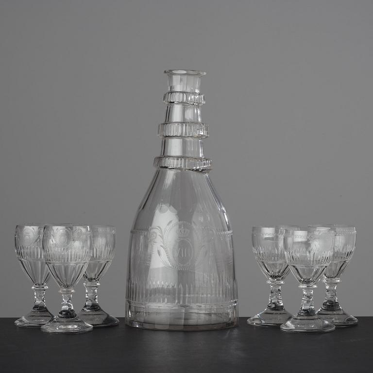 A large bottle and six glasses, Sweden, Reijmyre glassworks, circa 1810. Engraved by Anders Spolander.