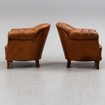 A pair of armchairs from the first half of the 20th century.