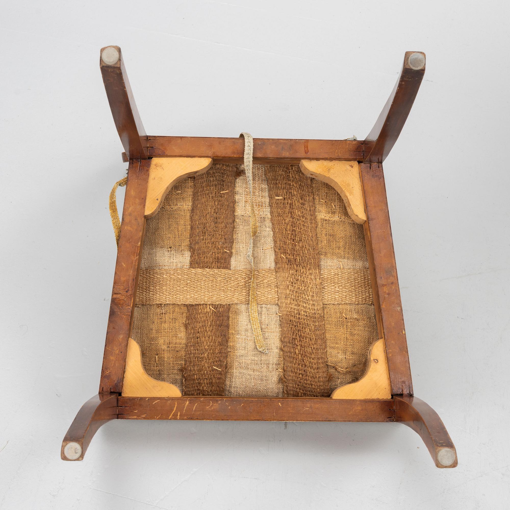 A set of four Empire chairs, first half of the 19th Century.