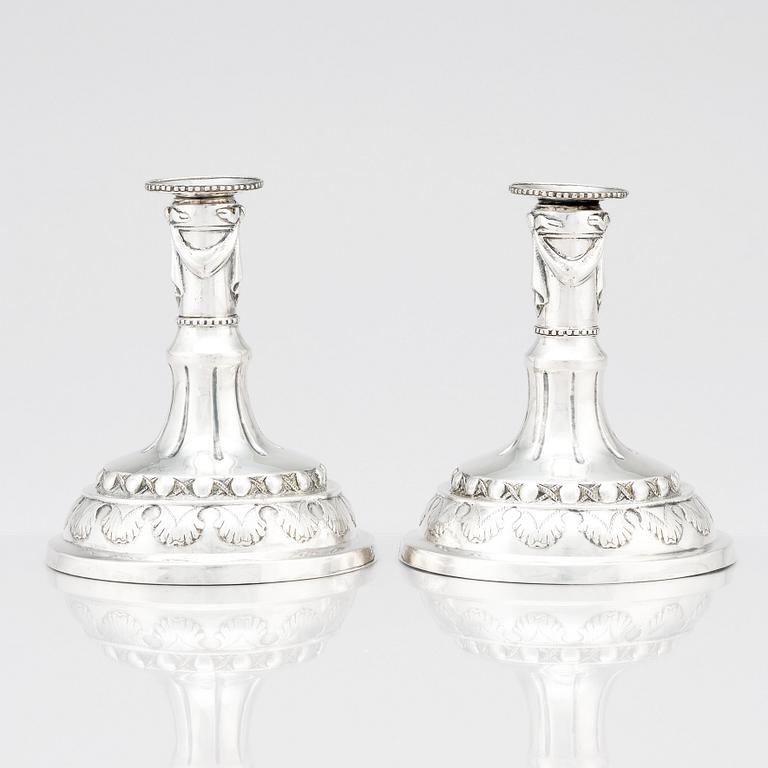 A pair of Swedish silver candlesticks, marks of Sigismund Novisadi the younger, Karlskrona 1780.