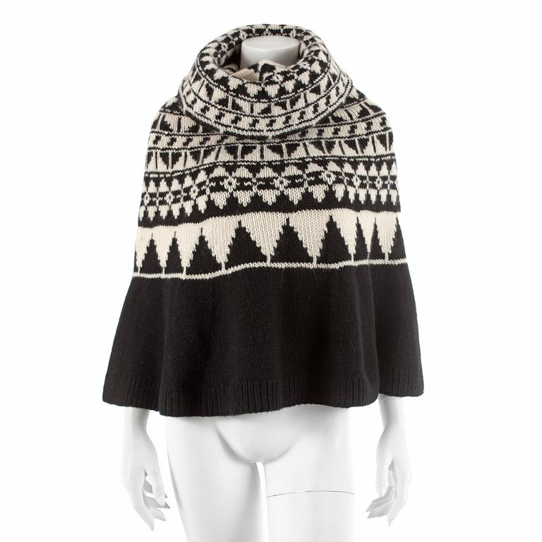 RALPH LAUREN, a black and white chasmere and mohair poncho. Size M/L.