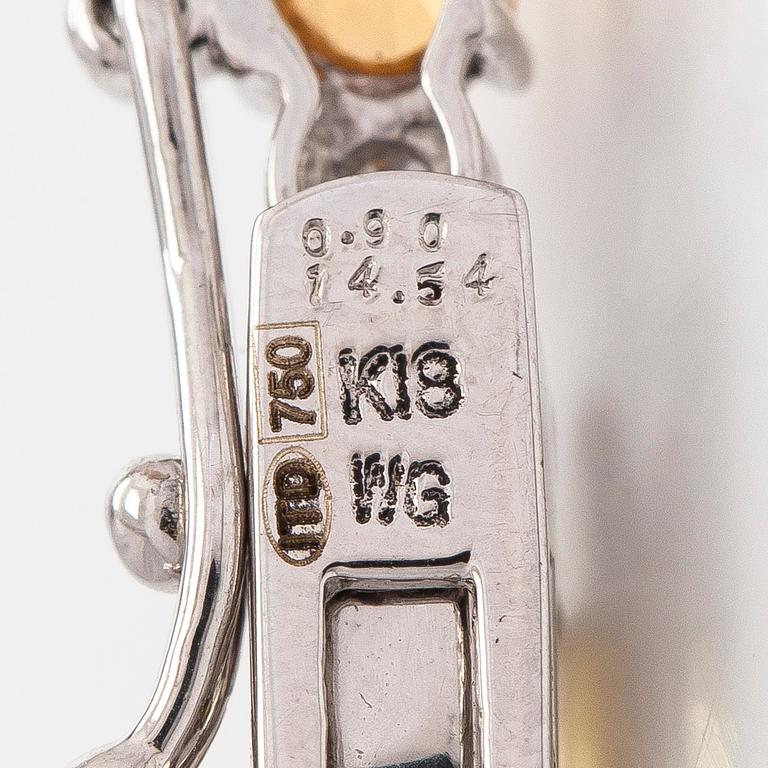 An 18K white gold necklace with multi-coloured sapphires and diamonds.