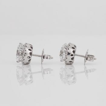A pair of brilliant-cut diamond earrings. 2.07 cts and 2.11 cts, D-E/SI2, according to certificates from HRD and IGI.