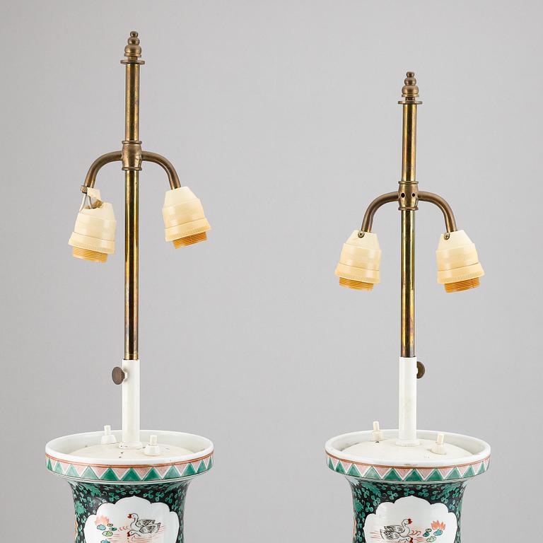 A pair of Chinese famille verte vases turned into table lamps, 20th century.