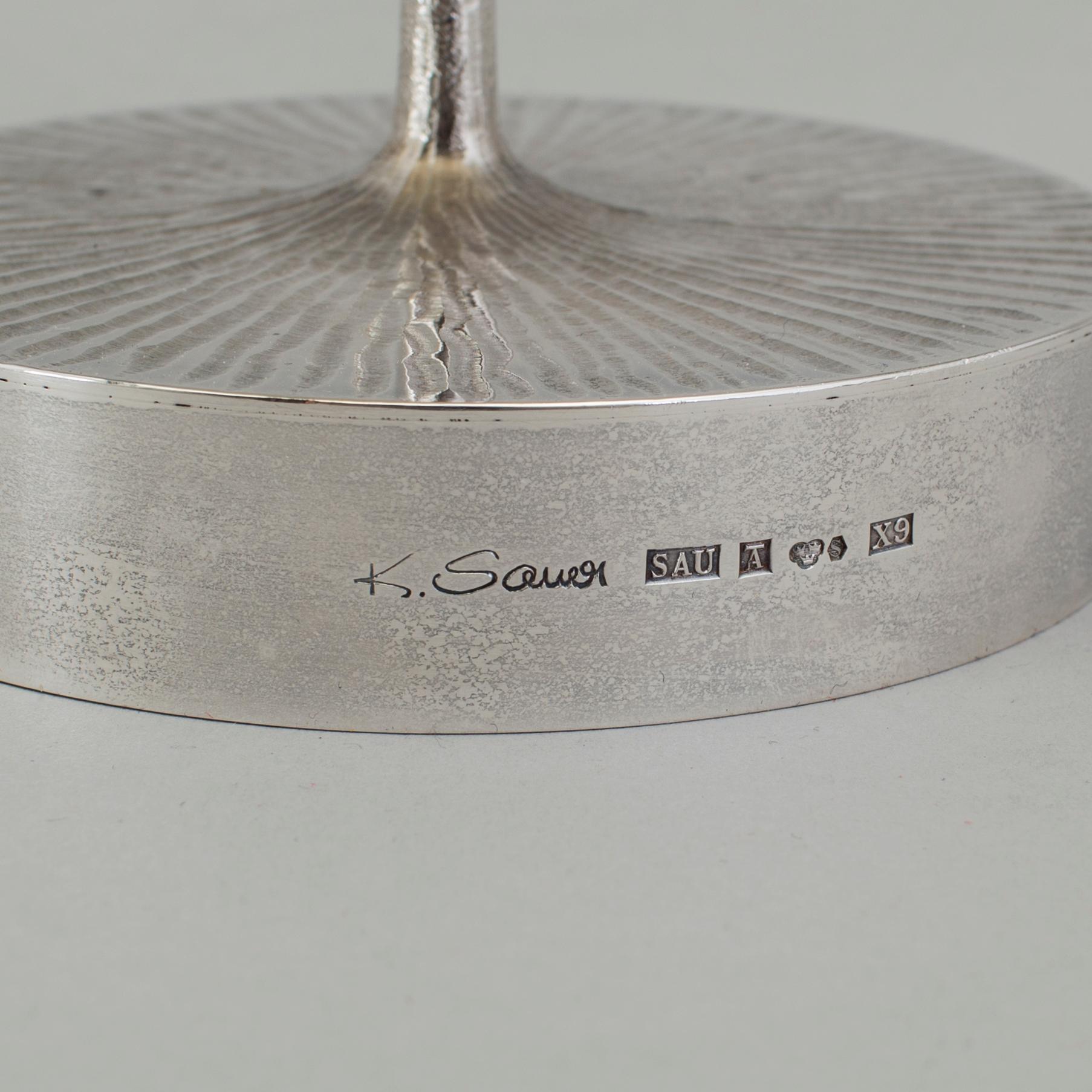 A pair of Karlheinz Sauer silver candlesticks, Västerås, Sweden 1972.
