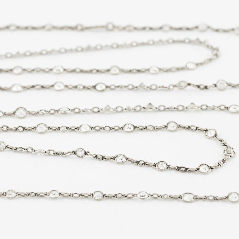 An antique platinum diamond long chain.