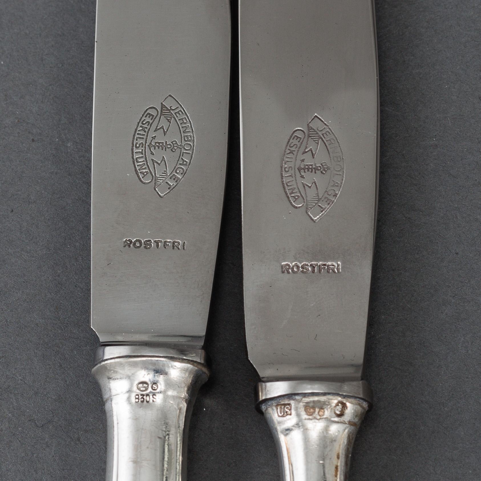 12 silver knives, model "Slottsbarock". Some CG Hallberg, Stockholm 1946.