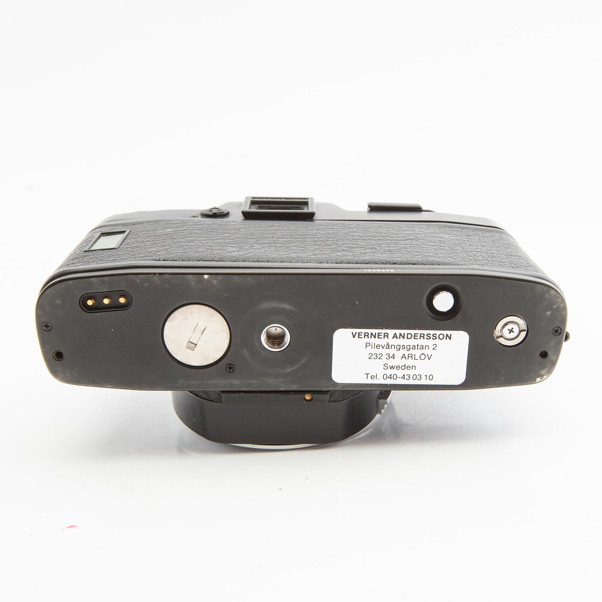 Leica R4s camera body, lens, and accessories.