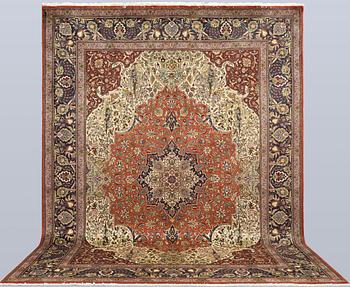 A Tabriz carpet, so called 40 Raj, c. 396 x 296 cm.