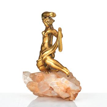 Thorwald Alef, a pewter gilt sculpture of a woman on a rock of qvartz, Svenskt Tenn, Sweden mid 20th century.