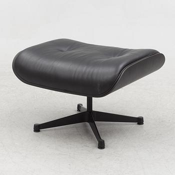 Charles & Ray Eames, an "Eames Lounge Chair" with ottoman, Vitra, 21st century.