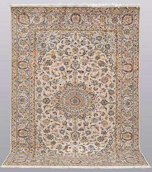 A carpet, Kashan, ca 300 x 200 cm.