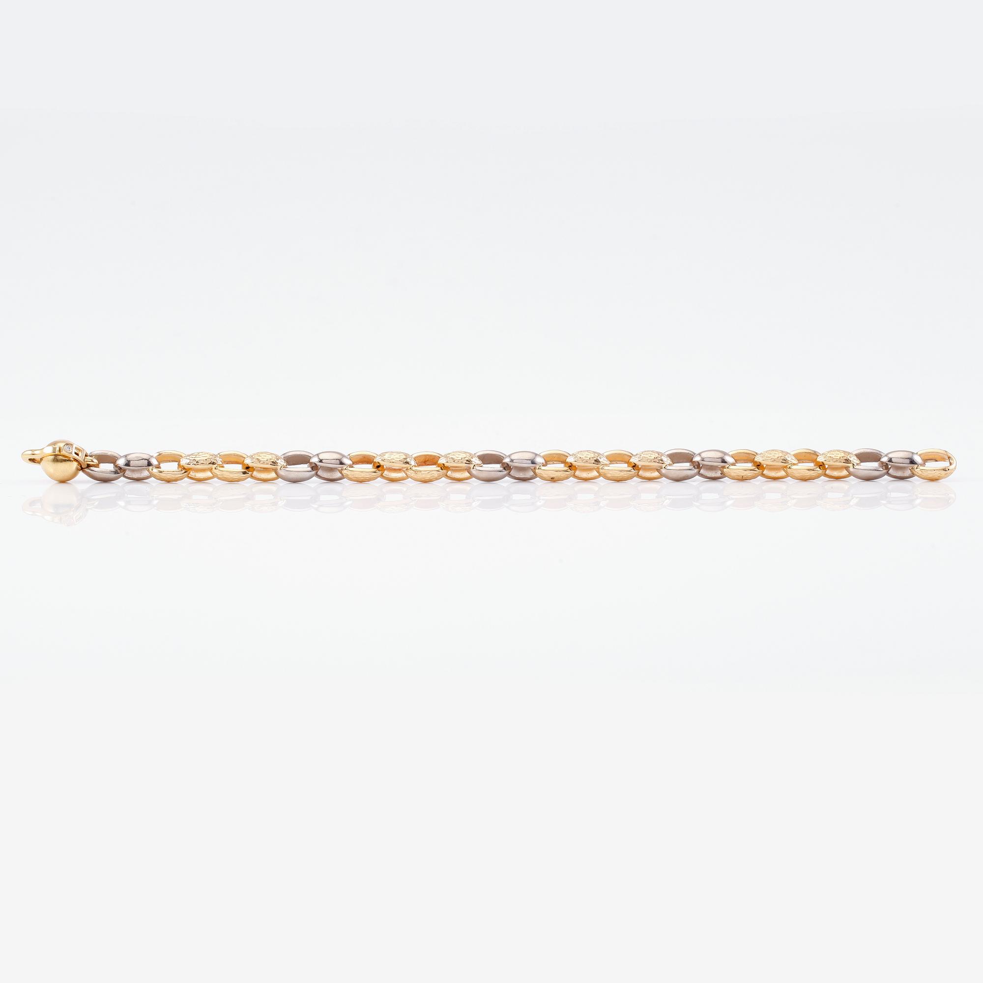 ARMBAND, 18K guld/vitguld samt mindre diamant, Per Borup. Total vikt ca 25 g.