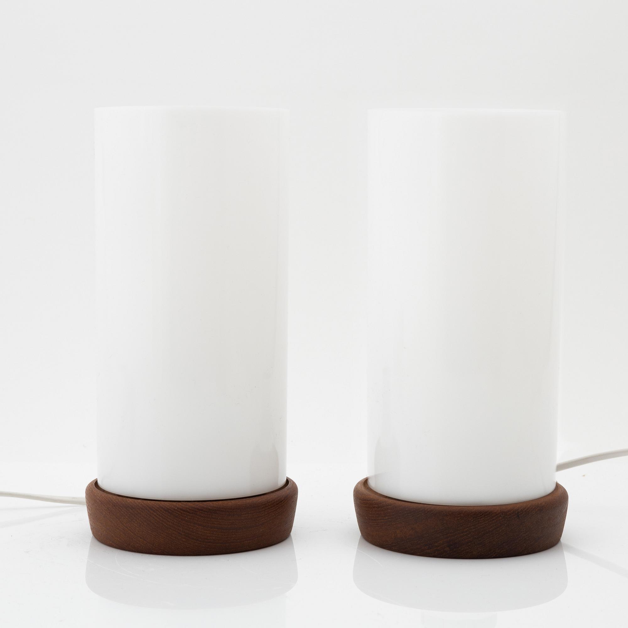 Uno & Östen Kristiansson, a pair of teak and acrylic table lights, Luxus, Vittsjö.